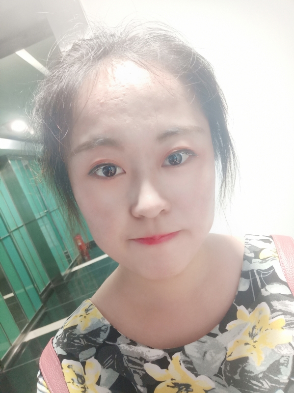 小花伞的第一张照片--烟台相亲服务中心