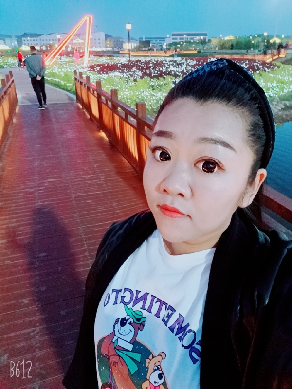 孙晓雪的第一张照片--烟台相亲服务中心