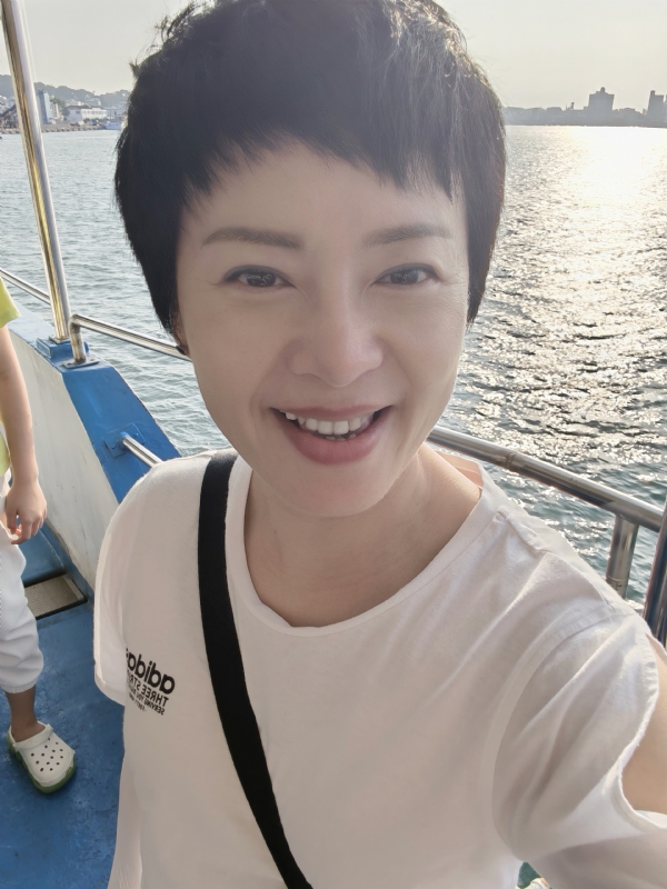 Tina的第一张照片--烟台相亲服务中心